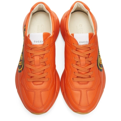 Shop Gucci Orange Logo Rhyton Sneakers In 7519 Orange
