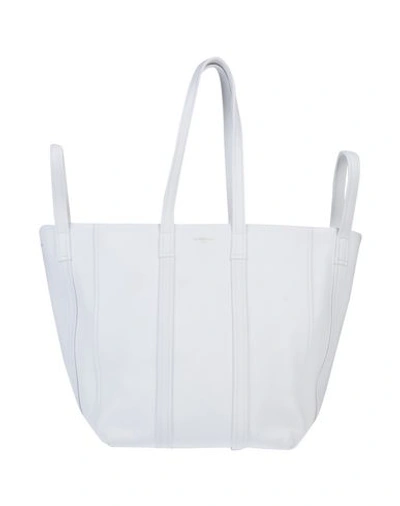 Shop Balenciaga Handbags In White