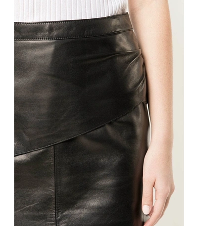 Shop Givenchy Mini Leather Skirt In Black