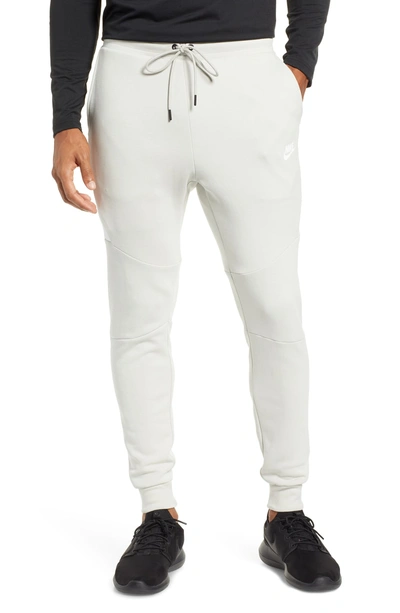 Shop Nike Tech Fleece Jogger Pants In Light Bone/ White/ White