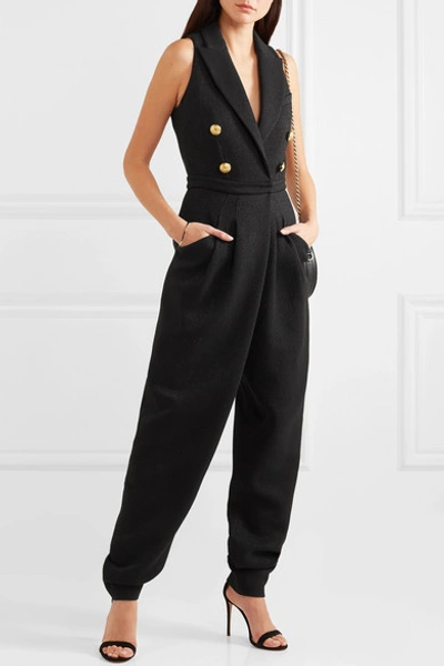 Shop Balmain Button-embellished Stretch-knit Jumpsuit In Black