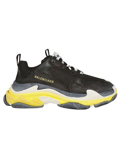 Shop Balenciaga Triple S Sneakers In Black/yellow