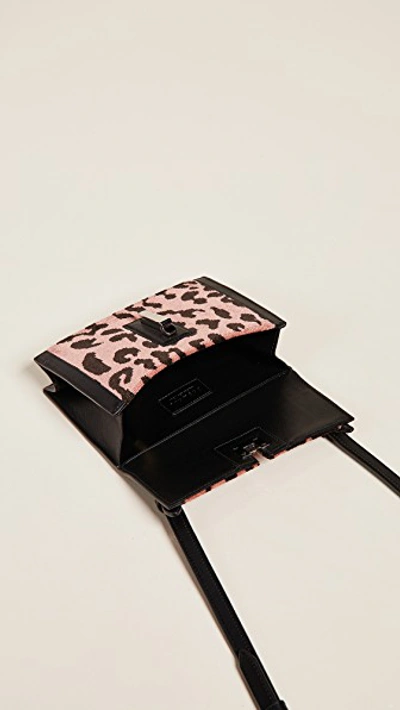 Shop Hayward Mini Soft Clutch In Pink Leopard/black