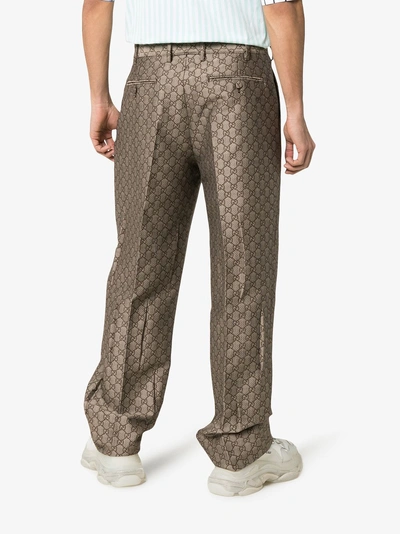 Shop Gucci Gg Logo Loose Fit Trousers In 9032 Brown
