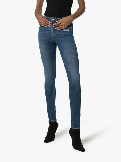 Shop Off-white Embroidered Logo Stretch Skinny Jeans In Blue