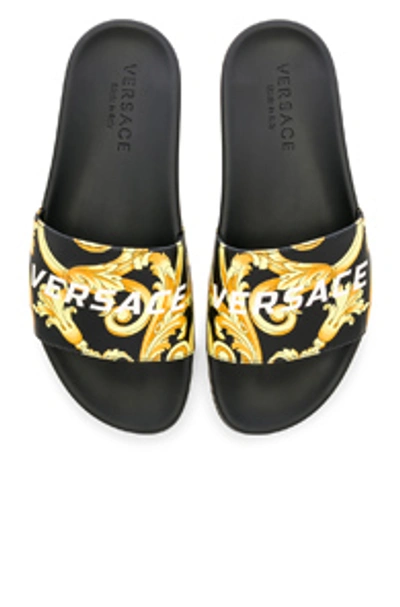 Shop Versace Hibiscus Print Sandal In Black