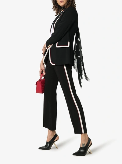 Shop Gucci Contrast Stripe Bootcut Trousers In 1152 Black