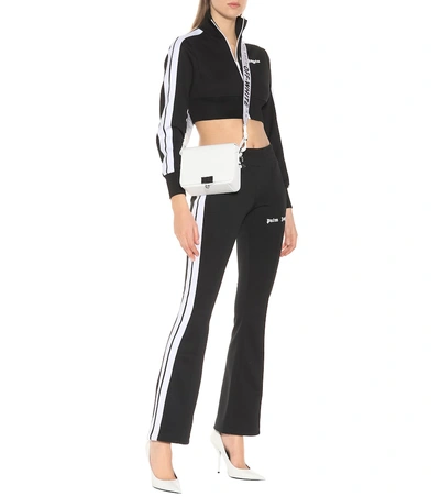 Shop Palm Angels Flared Jersey Trackpants In Black