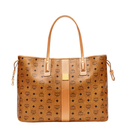 Shop Mcm Reversible Liz Shopper In Visetos In Cognac | Cognac