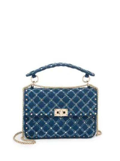 Shop Valentino Medium Rockstud Spike Denim Shoulder Bag In Blue