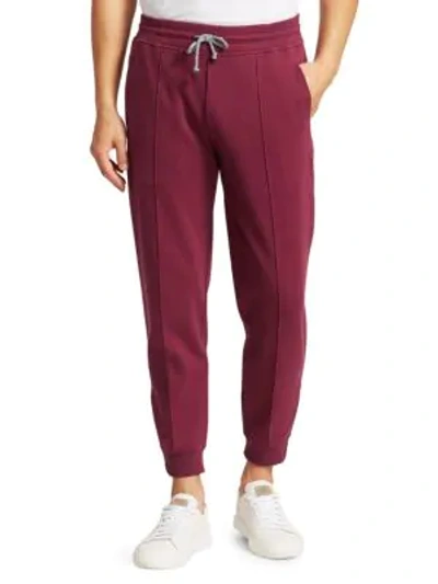 Shop Brunello Cucinelli Banded Permanent Crease Joggers In Dark Red