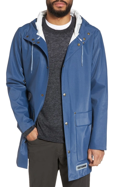 Shop Stutterheim Stockholm Waterproof Hooded Raincoat In Workwear Blue