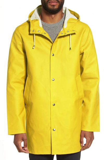 Shop Stutterheim Stockholm Waterproof Hooded Raincoat In Yellow