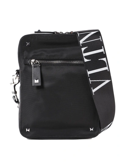 Shop Valentino Vltn Crossbody Bag In 0no Black/white