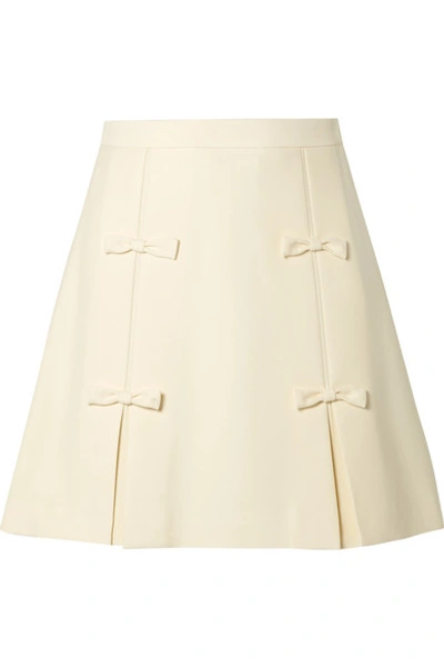 Shop Miu Miu Bow-embellished Cady Mini Skirt In Cream