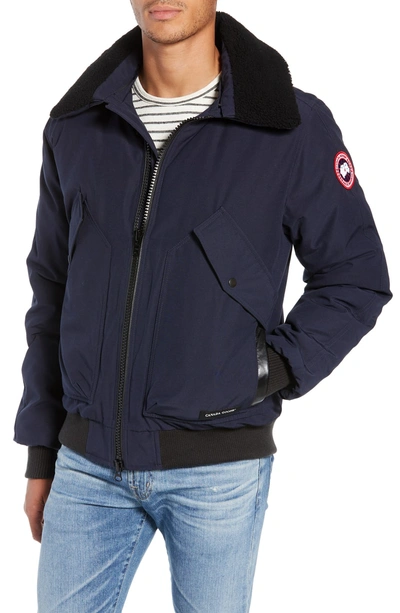 Shop Canada Goose Bromley Slim Fit Down Bomber Jacket With Genuine Shearling Collar In Admiral Blue