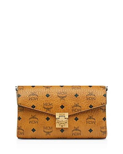 Shop Mcm Millie Small Crossbody In Cognac/gold