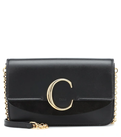 Shop Chloé C Leather Clutch In Black