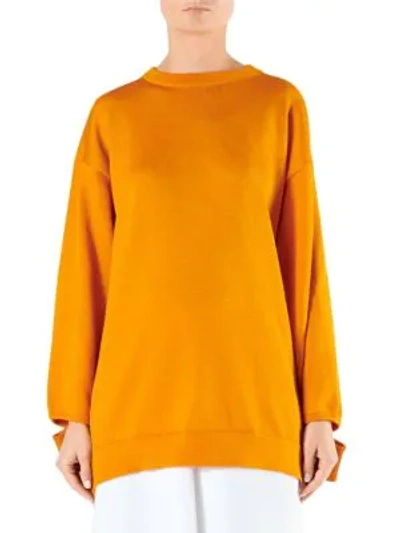 Shop Tibi Corded Oversized Pullover Sweater In Marmalade