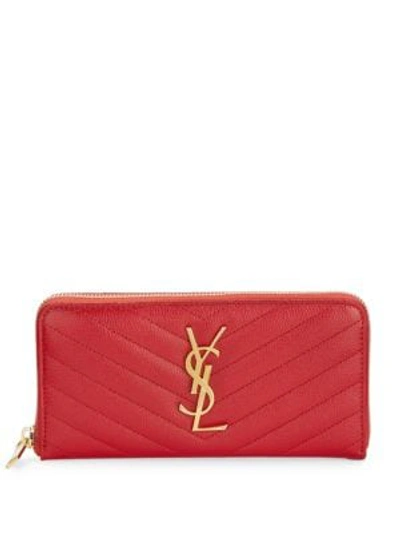 Shop Saint Laurent Monogram Matelassé Leather Zip-around Wallet In Ink Red