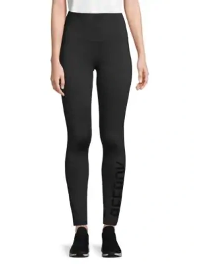 Shop Reebok High-rise Logo Leggings In Black