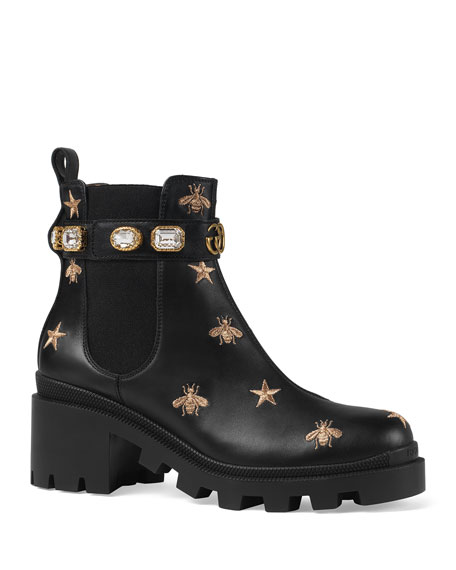 embroidered leather ankle boot with belt gucci