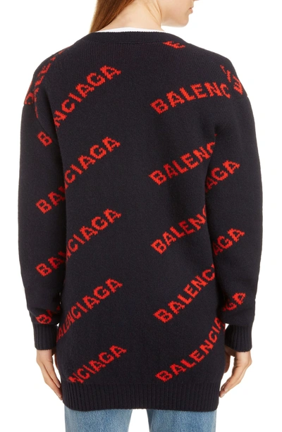Shop Balenciaga Logo Jacquard Wool Blend Cardigan In Navy/ Orange