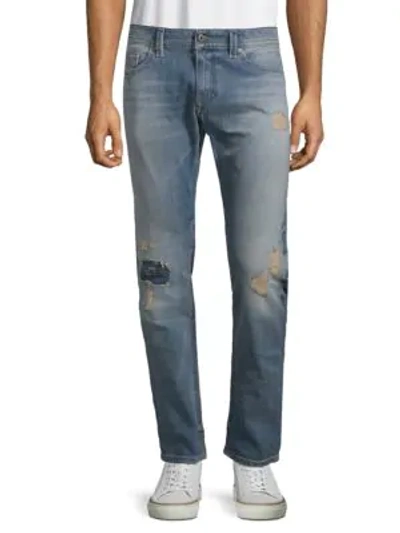 Shop Diesel Thavar Stretch Cotton Slim-fit Jeans In Denim