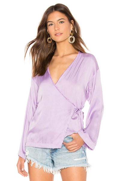 Shop Cali Dreaming Poet Wrap Top In Orchid