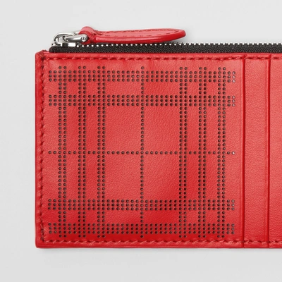 Shop Burberry Perforated Check Leather Zip Card Case In Rust Red