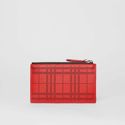 Shop Burberry Perforated Check Leather Zip Card Case In Rust Red