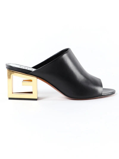 Shop Givenchy Triangle Mules In Black