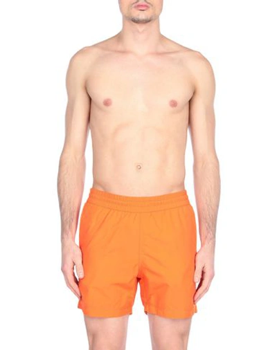 Shop Carhartt Swim Shorts In Orange