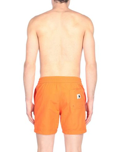 Shop Carhartt Swim Shorts In Orange