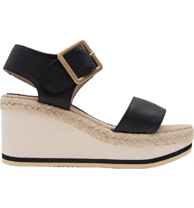 Shop Andre Assous Carmela Wedge Sandal In Black Leather