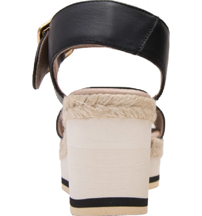 Shop Andre Assous Carmela Wedge Sandal In Black Leather