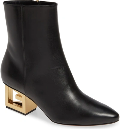 Shop Givenchy Triangle Heel Ankle Boot In Black