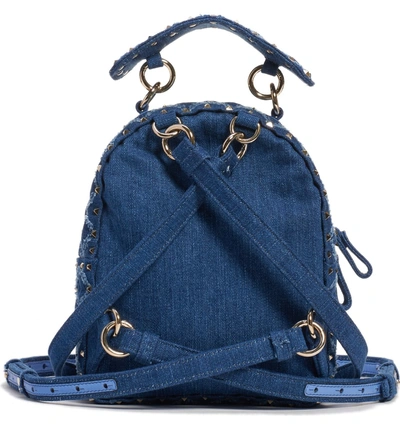 Shop Valentino Mini Rockstud Spike Denim Backpack