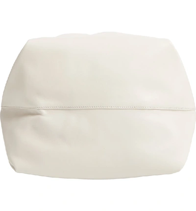 Shop Saint Laurent Teddy Leather Bucket Bag In Cremasoft