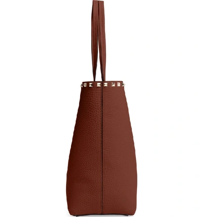 Shop Valentino Rockstud Leather Tote In Bright Cognac