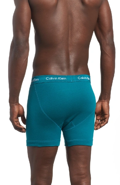 Shop Calvin Klein 3-pack Boxer Briefs In Blue/ Sea Green/ Amaranth