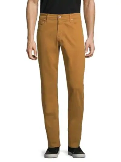 Shop Ag Graduate Slim Straight-fit Jeans In Burnt Saffron