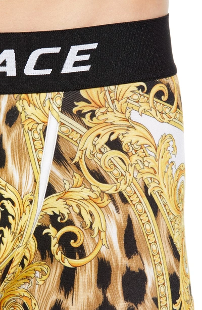 Shop Versace Parigamba Basso Trunks In White