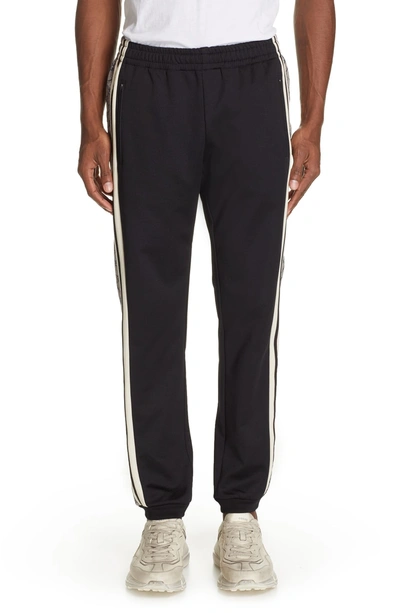 Shop Gucci Side Stripe Jogger Pants In Black