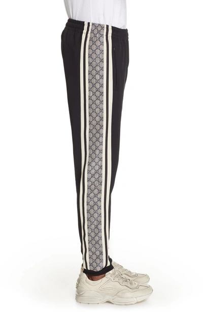 Shop Gucci Side Stripe Jogger Pants In Black