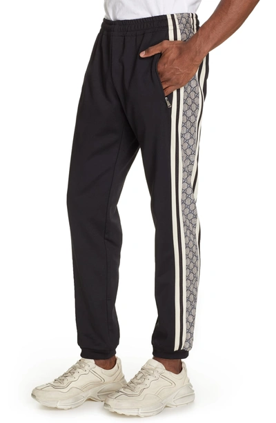 Shop Gucci Side Stripe Jogger Pants In Black