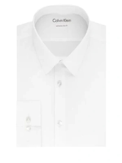 Shop Calvin Klein Extra-slim Fit Solid Dress Shirt In White