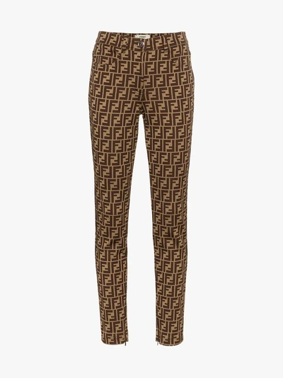 Shop Fendi Ff Logo Print Trousers In Brown