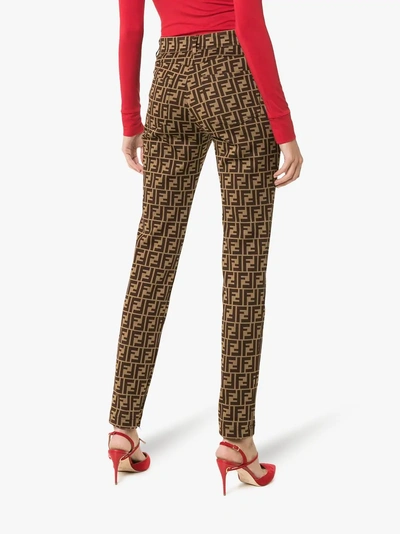 Shop Fendi Ff Logo Print Trousers In Brown