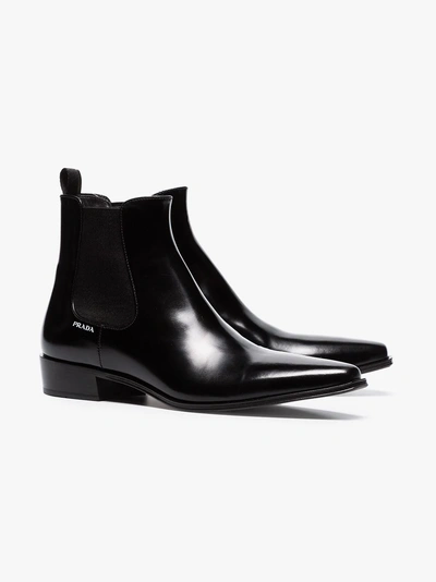 Shop Prada 30 Leather Ankle Boots In Black